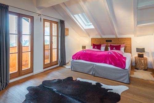 Ferienwohnung Hochsitz | Schlafzimmer mit Balkon & Seeblick